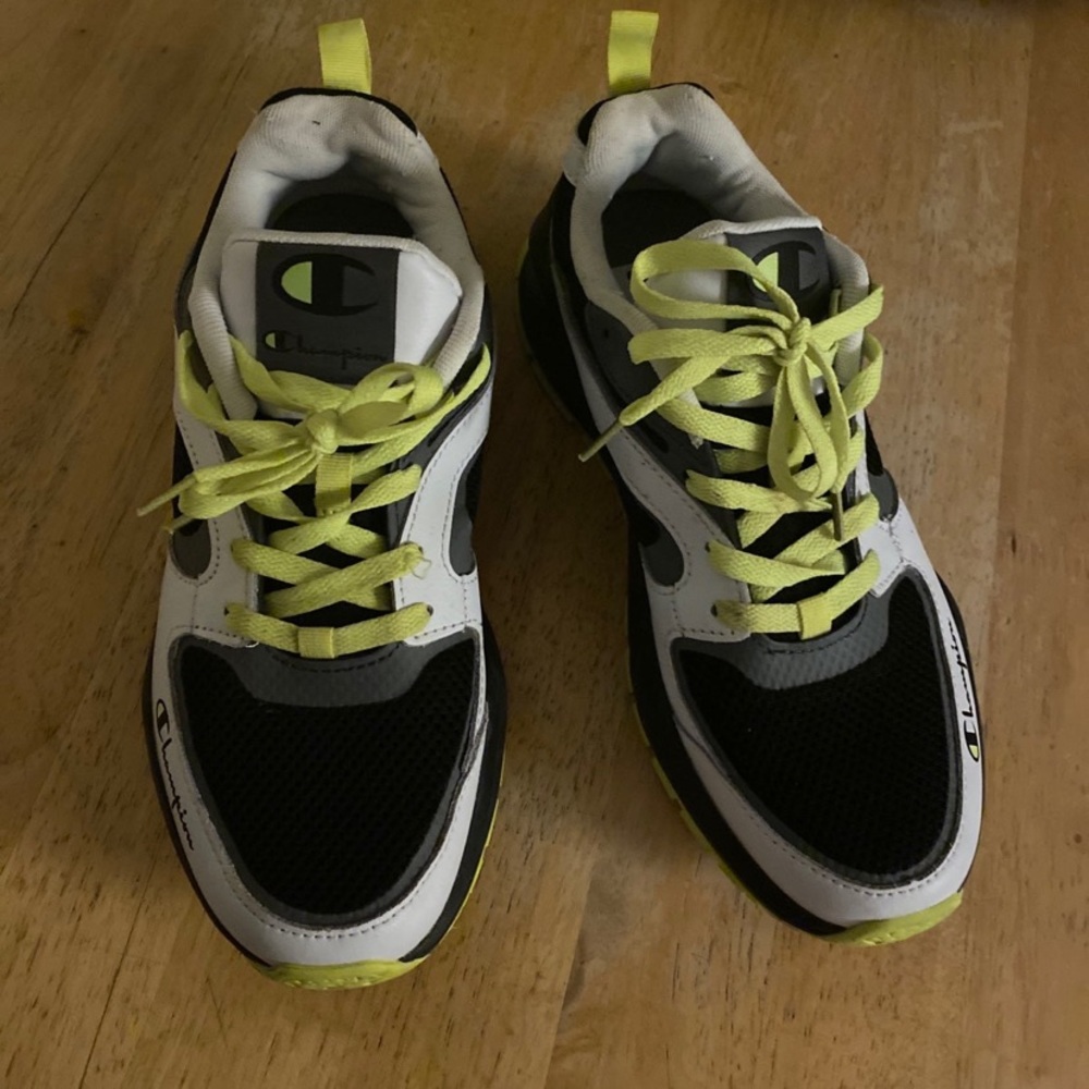 Neon green, black and white champion tennis shoes
